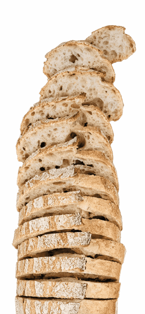 Geschnittenes Bio-Hausbrot von Bäckerei Schrott mit knuspriger Kruste und luftiger, lockerer Krume.